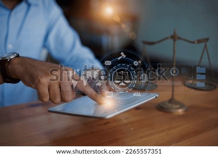 Justice and law concept. Lawyer business hands using law innovation network icons on blurred background.