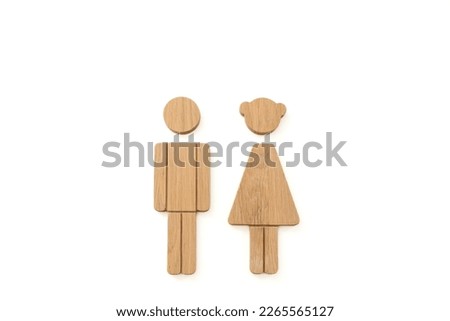 Man and Woman wooden vintage sign.Toilet sign on the whiteboard,Photography of wooden labels of man and woman icons, toilet sign, restroom icon, minimal style.toilet sign on isolated white background
