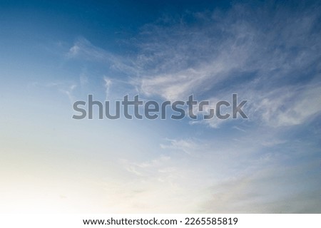 blue sky and fluffy soft white cloud background and texture, concept for freedom and bright ozone air, design for backdrop and nature wallpaper 