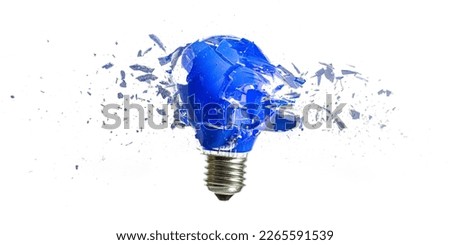 blue bulb destroying on white background, high speed photography. Royalty-Free Stock Photo #2265591539