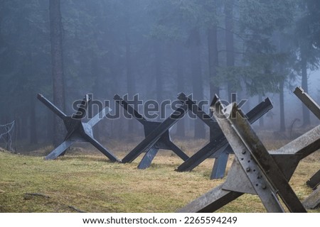 A concrete bunker on the border that was part of the Czechoslovak fortifications. Royalty-Free Stock Photo #2265594249