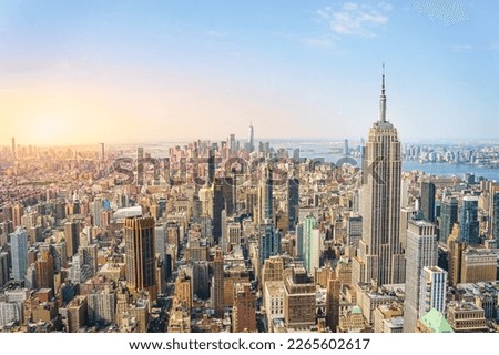 Amazing panorama view of New York city skyline and skyscraper at sunset. Beautiful cityscape in Midtown Manhattan. Copy space for text. Royalty-Free Stock Photo #2265602617
