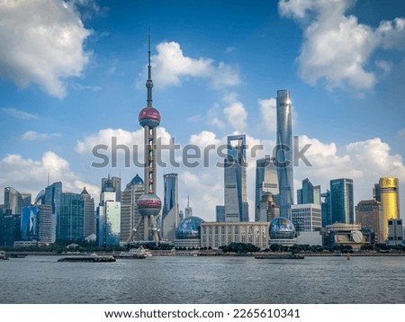 A view of Pudong from The Bund with the Pearl and modern architecture skyline. Royalty-Free Stock Photo #2265610341