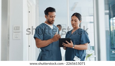 Medical advice, help and doctors with a tablet for healthcare, research and medicine planning. Communication, collaboration and men working in cardiology talking about surgery results on technology Royalty-Free Stock Photo #2265615071