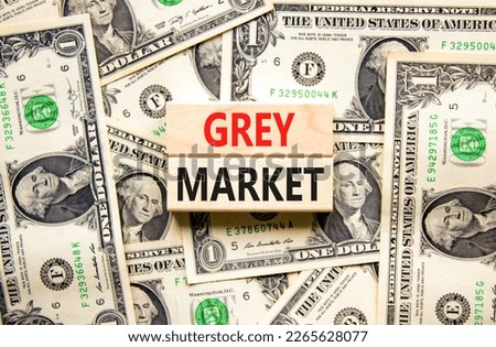 Grey market symbol. Concept words Grey market on wooden block. Beautiful background from dollar bills. Dollar bills. Business grey market concept. Copy space.