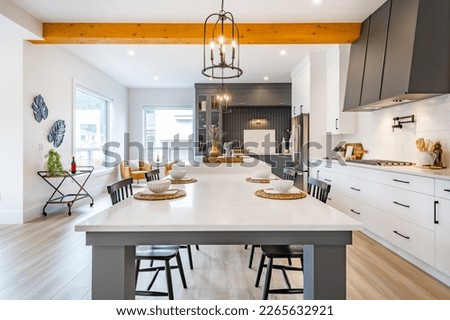 Elegant modern farmhouse style home interior kitchen living room bar and foyer Royalty-Free Stock Photo #2265632921