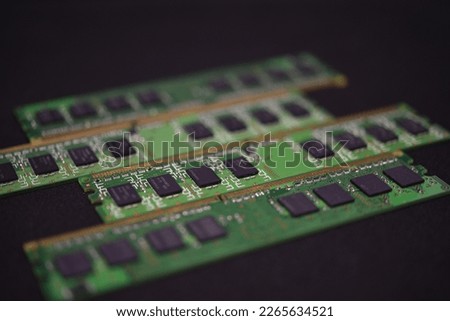 Blue RAM bars on a black background. Computer memory chips. Computer chips.