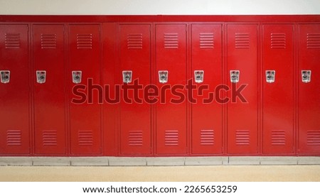 close up on red lockers in the school Royalty-Free Stock Photo #2265653259