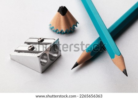 A set of pencils. The concept of a broken pencil. Sharpening a pencil. Close up. Macro. Pencil sharpener. Royalty-Free Stock Photo #2265656363