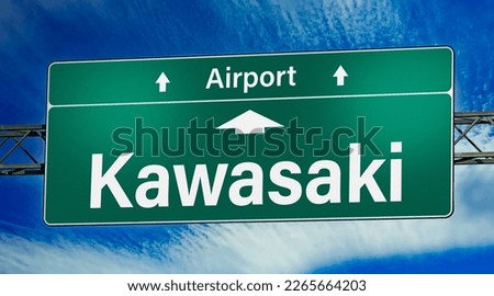 Road sign indicating direction to the city of Kawasaki.