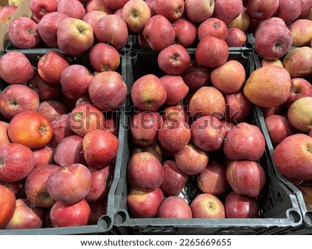 red apples in boxes on display Royalty-Free Stock Photo #2265669655