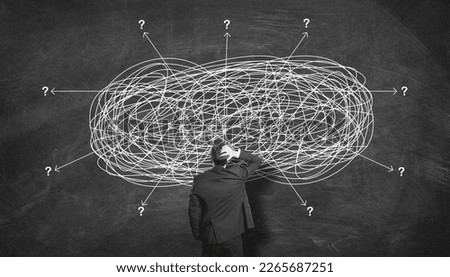 Businessman Looking At perplexed ways Searching For Solution. Business Man Thinking To Solve Difficult Task or figure out The way in a Complicate Line. Difficulty and Simplicity Creative Idea	
 Royalty-Free Stock Photo #2265687251
