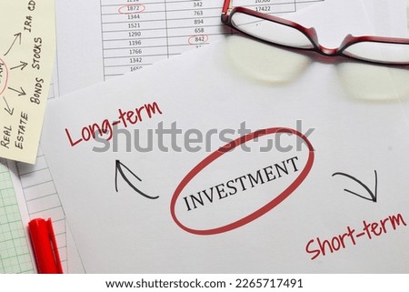 Long term short term investment concept on desk.  Royalty-Free Stock Photo #2265717491