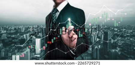 Businessman analyst working with digital finance business data graph showing technology of investment strategy for perceptive financial business decision. Digital economic analysis technology concept. Royalty-Free Stock Photo #2265729271