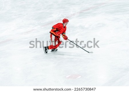 hockey player on the ice surface of the stadium