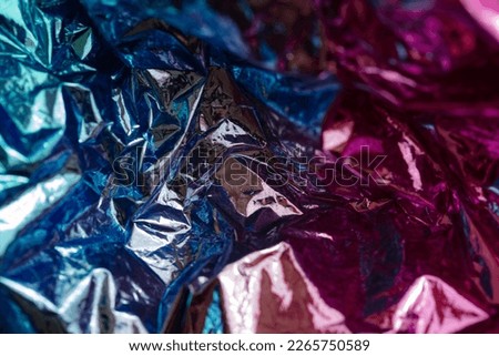 Closeup of colorful wrinkled metallic textured background for design purpose