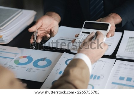 Financial business plan meeting Take notes in a notebook with a pen and analyze data with reports, data graphs and calculators for efficient, intuitive and efficient work.