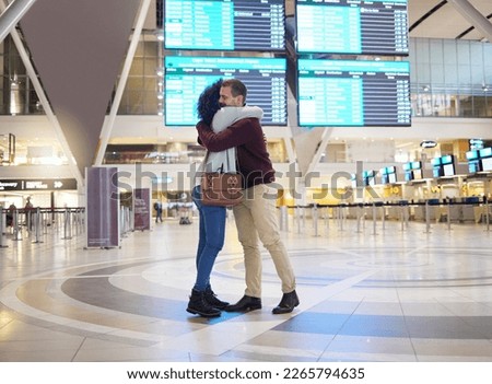 Couple, hug and goodbye at airport for travel, trip or flight in farewell for long distance relationship. Man and woman hugging before traveling, departure or immigration arrival waiting for airline Royalty-Free Stock Photo #2265794635