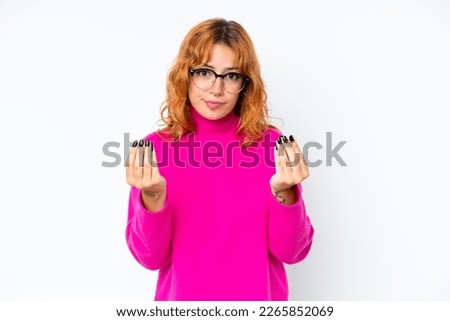 Young caucasian woman isolated on white background making money gesture but is ruined