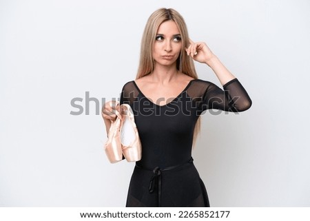 Pretty blonde woman practicing ballet isolated on white background having doubts and thinking