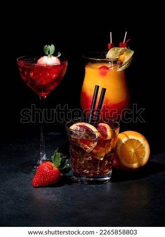 Set of various colorful cocktails on black background. Classic long drink cocktails menu concept. 