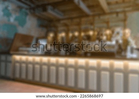 Defocused and blurred image for background of restaurant with bokeh light on background.
