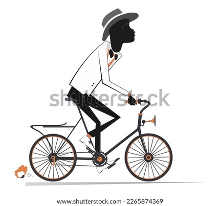 African young man rides a bike. 
Smiling African man rides a bike. Isolated on white background
