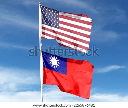 American flag and Taiwan flag with blue sky. waving in the sky