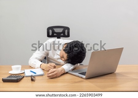 Man with narcolepsy is fall asleep on office desk.
Narcolepsy is a sleep disorder that makes people very drowsy during the day. Royalty-Free Stock Photo #2265903499