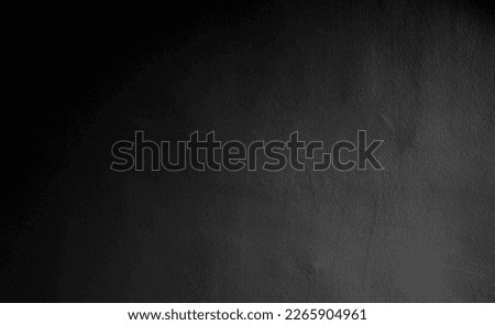 Black wall background. wide panorama picture. Grey textured wall, dark edges. Old black wall.Grunge texture. horror wall. Dark texture. stucco wallpaper. Room with black concrete background.