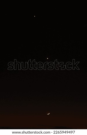 crescent moon, jupiter and venus in the sky