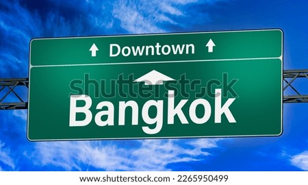 Road sign indicating direction to the city of Bangkok.