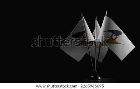 Small national flags of the Eurasian Economic Union on a black background. Royalty-Free Stock Photo #2265965695