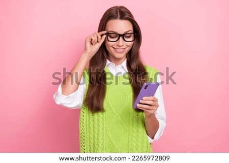 Photo of gorgeous intelligent lady wear stylish clothes write news share instagram facebook post isolated on pink color background