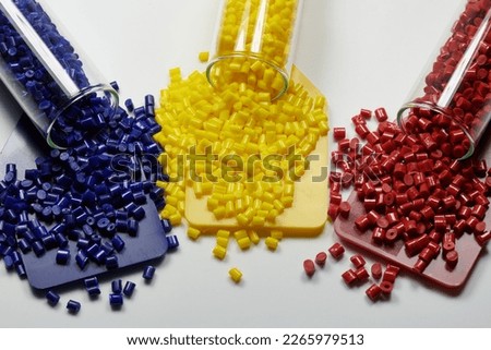 Colored plastic resins in test tubes in laboratory Royalty-Free Stock Photo #2265979513