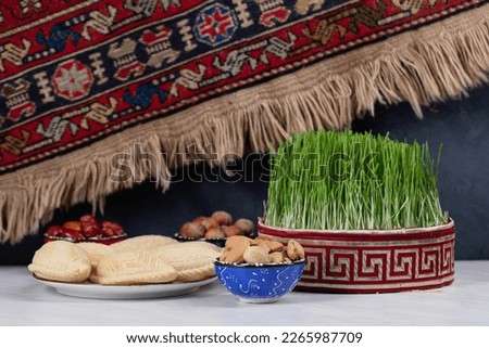 The table prepared for the Azerbaijan National Day includes Semeni, walnuts, hazelnuts and Shekerbura