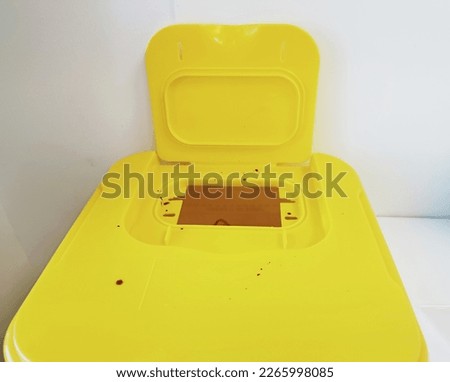 sanitary container to throw waste from the activity of the doctor and the nurse. sharps container