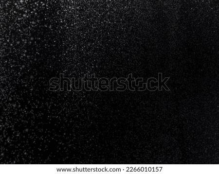 Abstract gold bokeh with black background Abstract Gold Glitter Explosion on Black Background