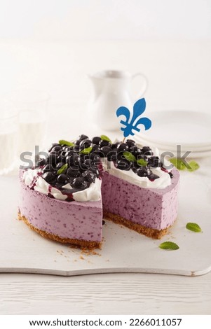 Blueberry cheesecake for the St-Jean-Baptiste Royalty-Free Stock Photo #2266011057