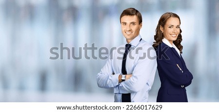Portrait image of confident businessman, businesswoman on blurred interior background. Business people, executive man and woman, professionals couple, office workers, bank managers.