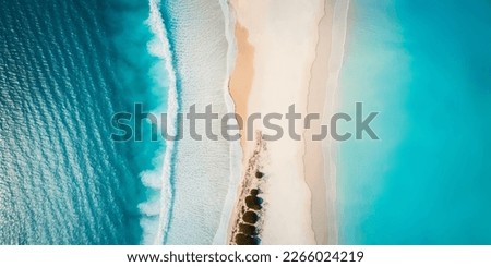 Aerial drone footage of sea ocean waves reaching shore.Beach with aerial drone. Beach clear turquoise top view. Beautiful beach. Royalty-Free Stock Photo #2266024219