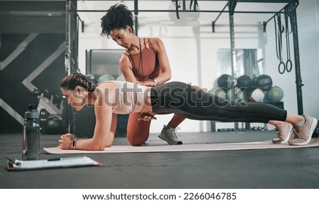 Fitness, plank or personal trainer at gym with woman for training, exercise or workout at health club. Women, focus or healthy sports athlete exercising with coach for progress, support or motivation Royalty-Free Stock Photo #2266046785