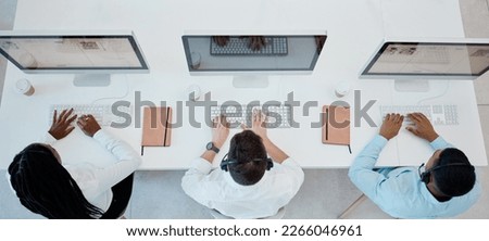 Top view, call center and consulting doing customer service, headset and computers doing typing in office. Business, coworkers and consultant workers doing client support, telemarketing and speak. Royalty-Free Stock Photo #2266046961