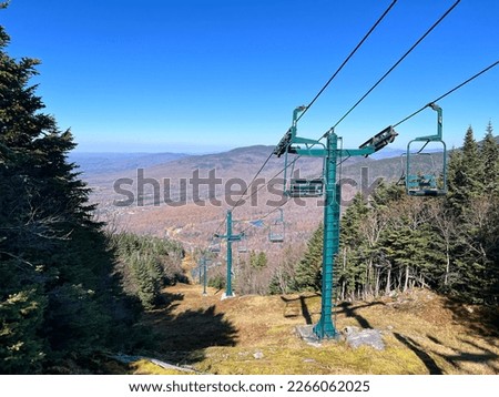 Empty ski lift waiting for the snow