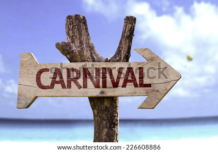 Carnival wooden sign with a beach on background