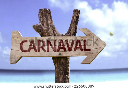 Carnival (In Portuguese) wooden sign with a beach on background