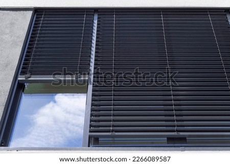 modern house with external blinds Royalty-Free Stock Photo #2266089587