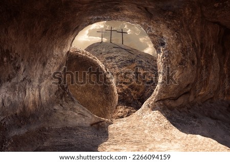 Three wooden crosses on a hill in the morning. Concept of Crucifixion on Mount Golgotha, resurrection of Jesus Christ. Christian Easter holiday symbol, Calvary. Blurred background, blur scene Royalty-Free Stock Photo #2266094159