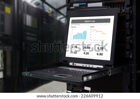 Abstract server computer KVM display in the modern interior of data center.  Royalty-Free Stock Photo #226609912