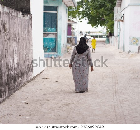 women wearing hijab walking in Ukulhas island